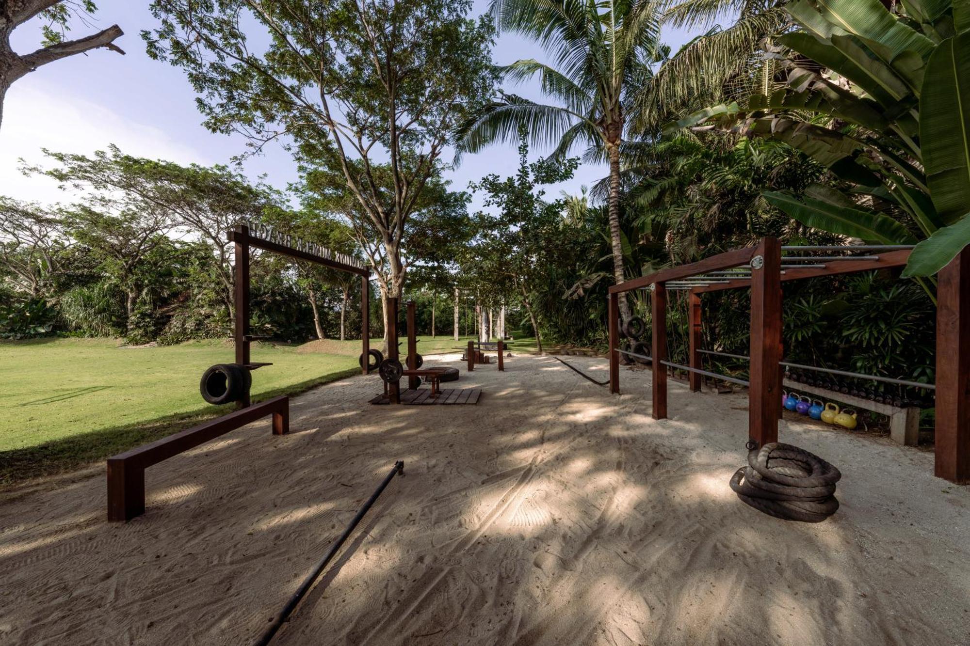 Hotel Komune And Beach Club Bali Керамас Экстерьер фото